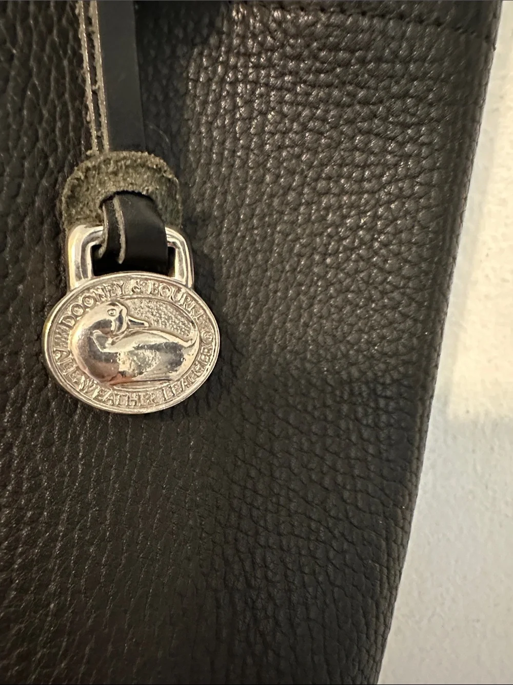 Dooney & Bourke Classic Vintage Black Leather Drawstring Sling Backpack